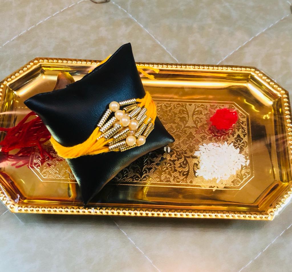 Divine Pearl Rakhi with Beads and Stones